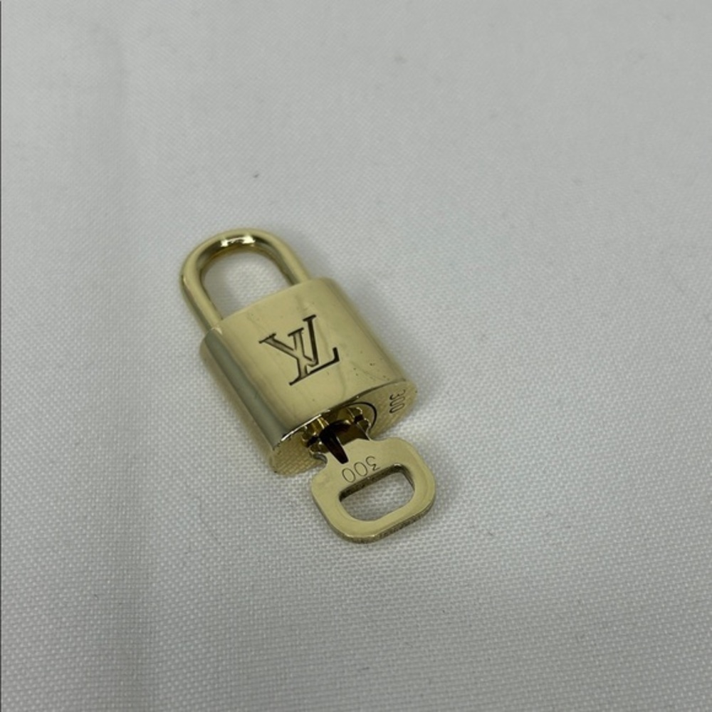 Louis Vuitton Lock Number 300 Just cleaned With Brass Polish Great Condition